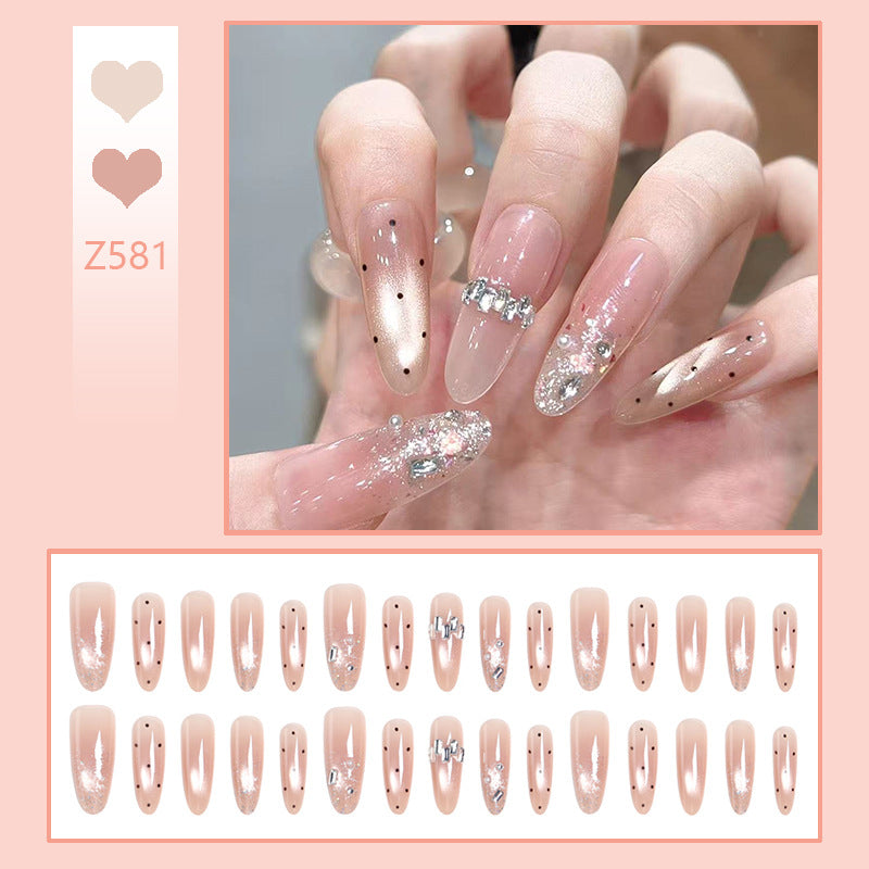 Artificial nail set with sparkling glitter and elegant jewelry details Bowlift