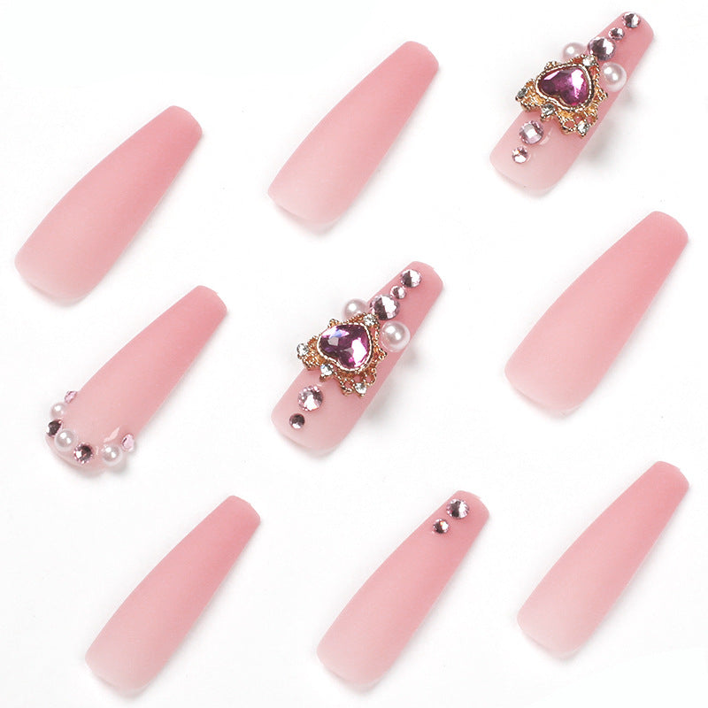 Creative artificial nails with heart-shaped decorative accents Bowlift