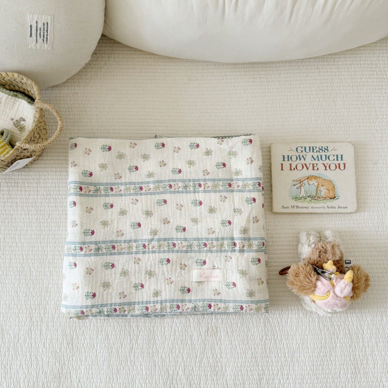 Unisex Muslin Blanket with delicate floral design and elegant ruffles Bowlift