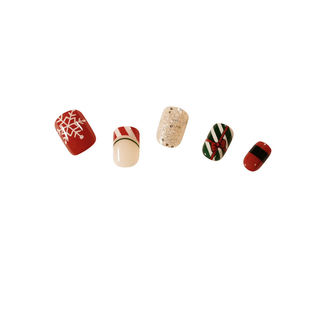 Elegant artificial nails with golden accents and floral design Bowlift