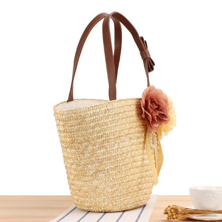 Beach bag with floral embellishments and stylish shoulder strap Bowlift