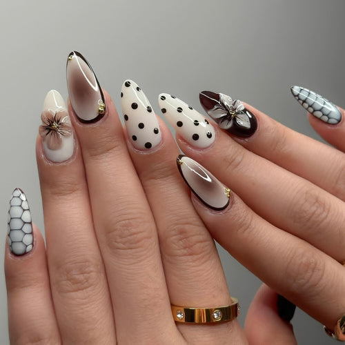 Designer artificial nails with floral and geometric accents Bowlift