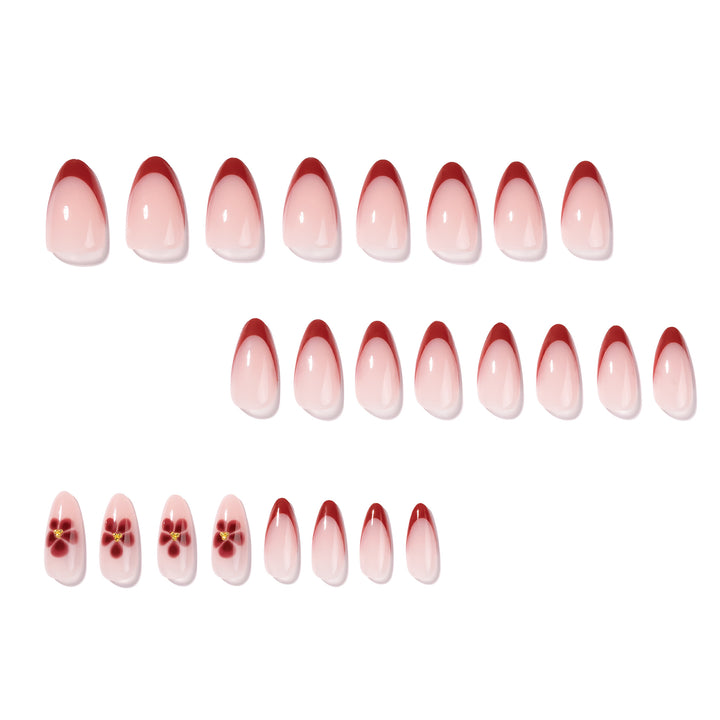 Elegant and artistically designed stiletto nails with flower design Bowlift