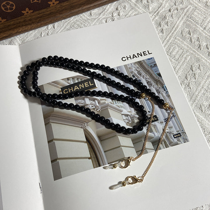 Fashionable jewelry band made of onyx beads Bowlift