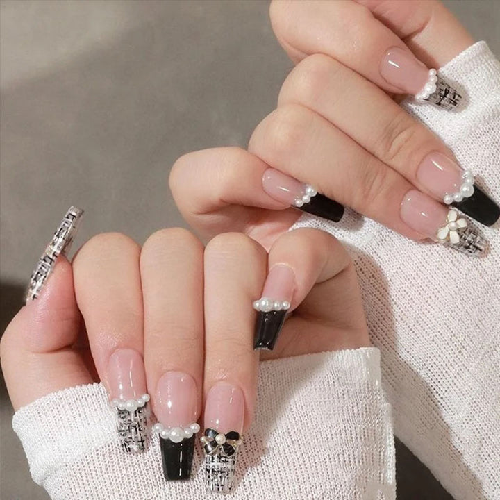 Glamorous artificial fingernails with glitter and moon designs Bowlift
