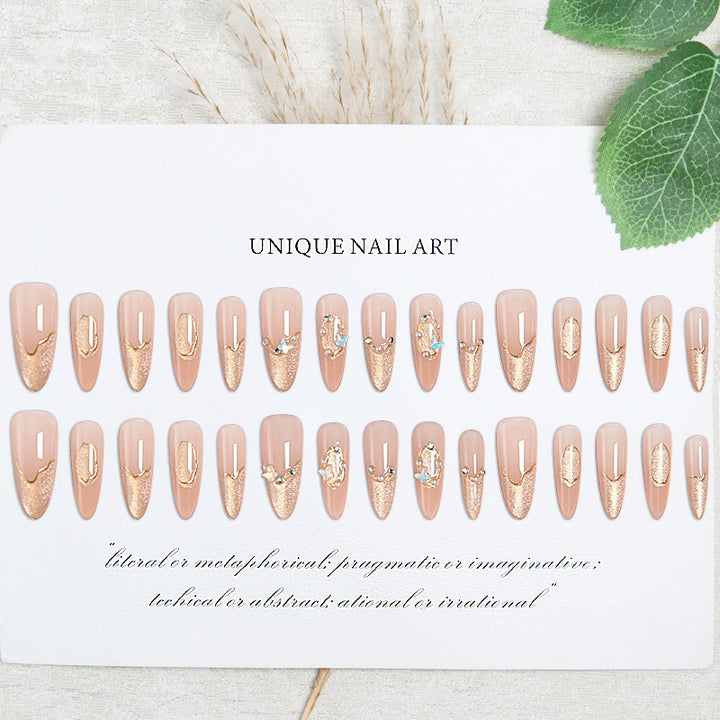 Art nail set with elegant gold glitter design Bowlift