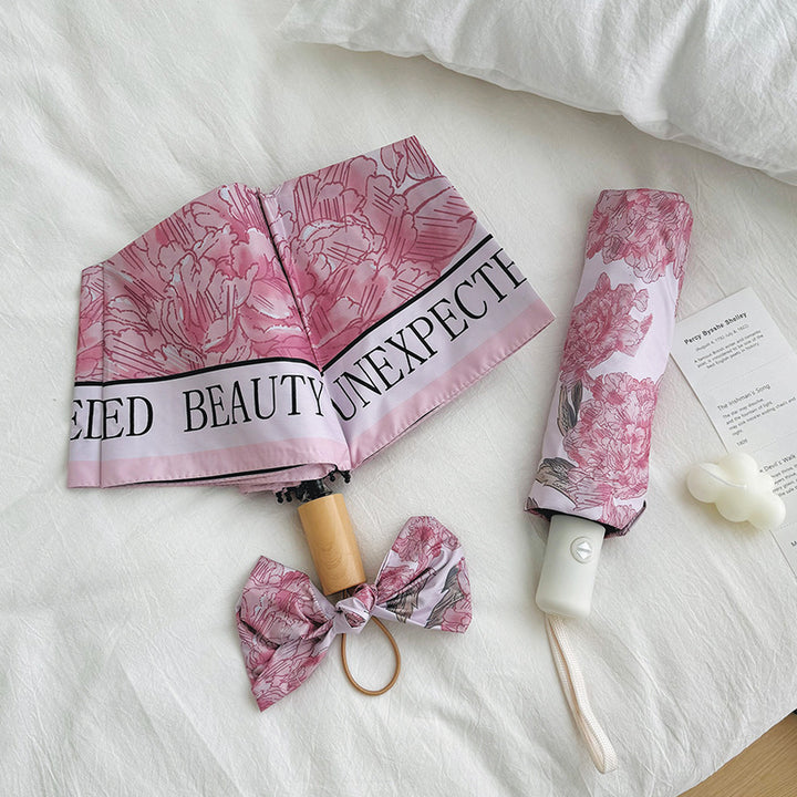 Women's compact umbrella with floral design Bowlift