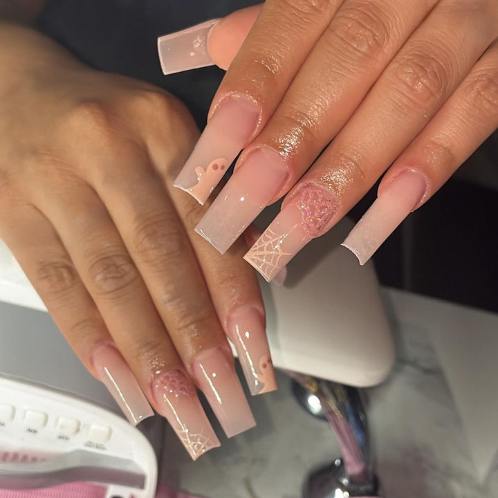 Nail set with filigree spider web design and delicate gradient Bowlift