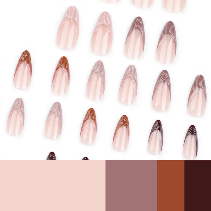 Artful stiletto nails with elegant gradient and glitter accents Bowlift