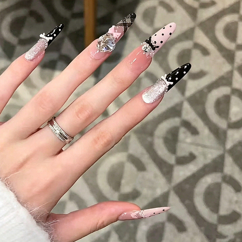 Artificial nail set with glamorous 3D applications and festive design Bowlift