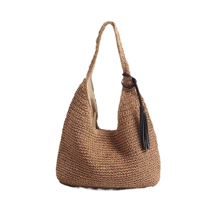 Handcrafted and Stylish Shoulder Bag with Decorative Tassel Detail Bowlift