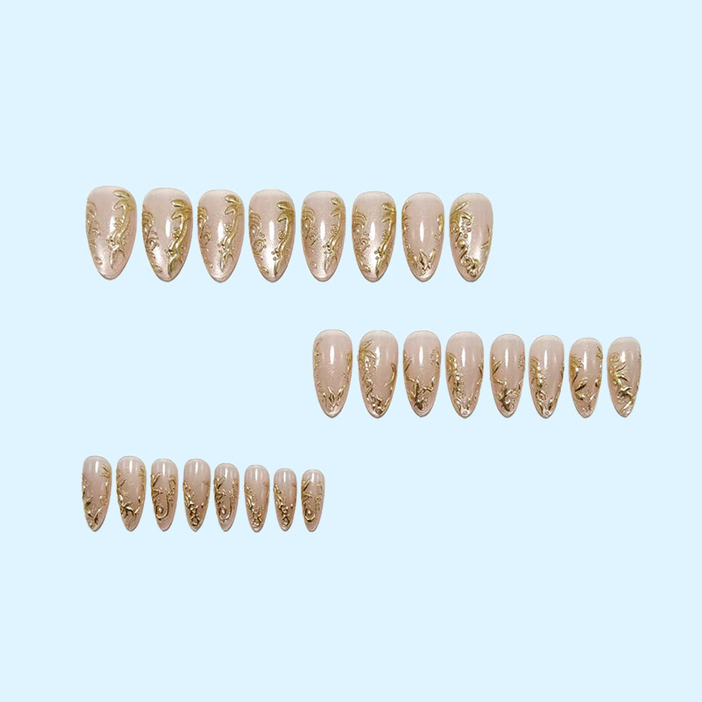 Glamorous artificial nails with delicate gold accents Bowlift