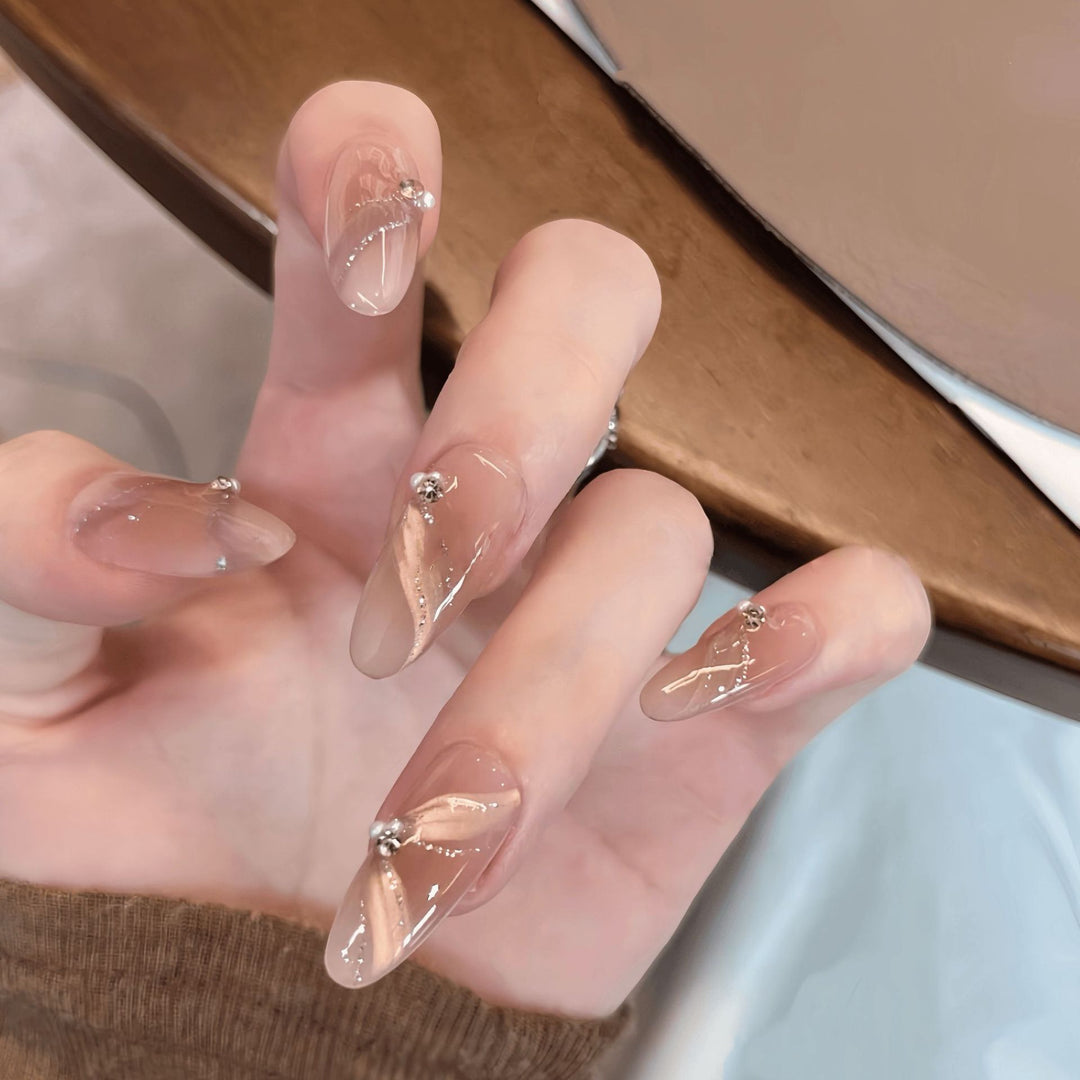 Artificial nails with elegant rhinestone accents Bowlift