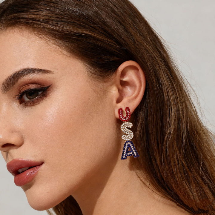 Women’s sparkling statement earrings with crystal beads and gold-plated setting Bowlift