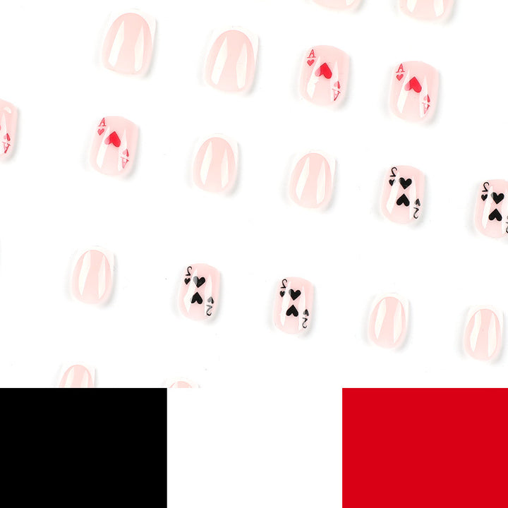 Playful nail art in playing card design Bowlift