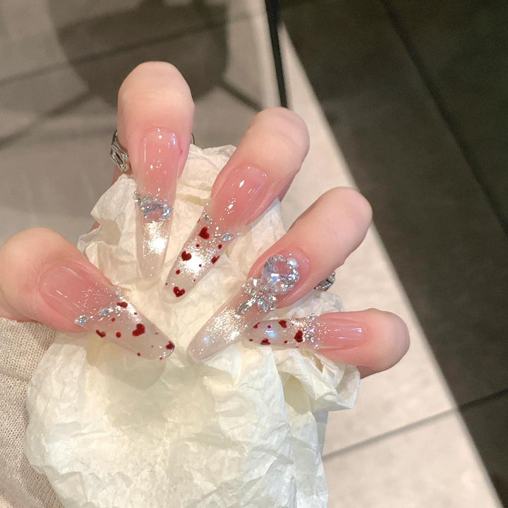 Nail art set with sparkling rhinestones and heart design Bowlift