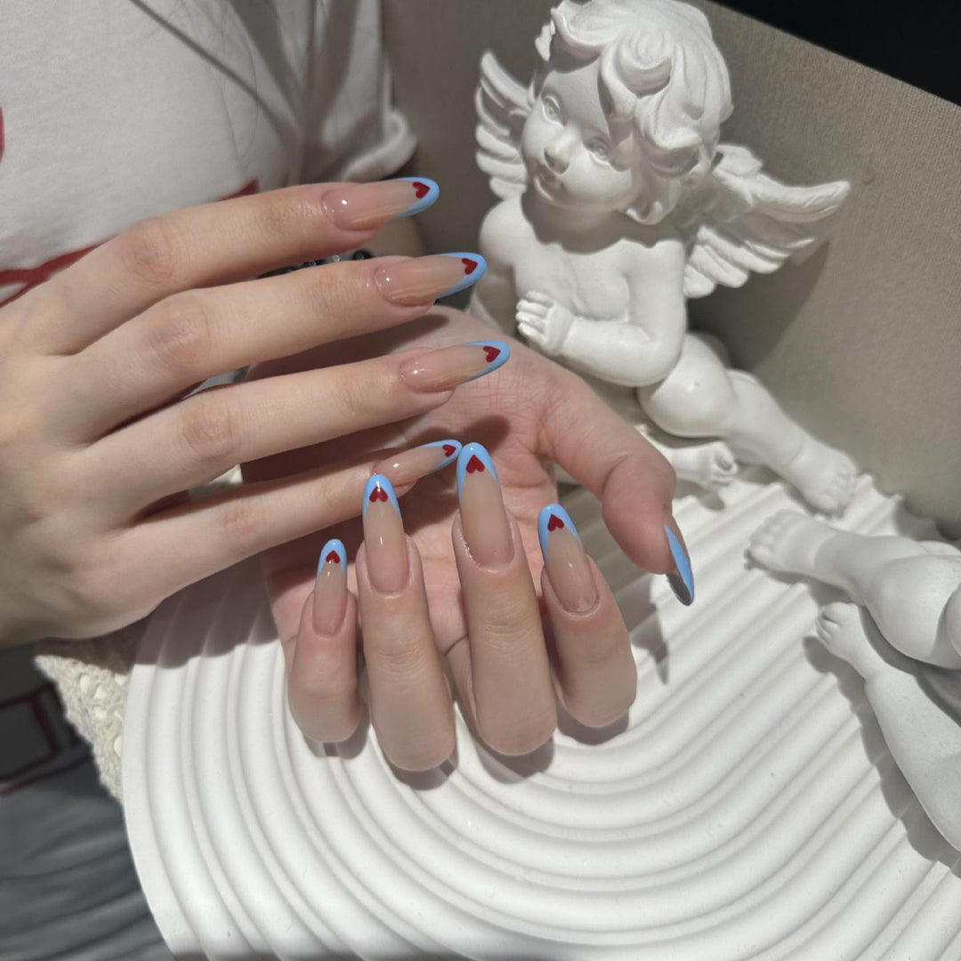 Nail art with heart-shaped design Bowlift