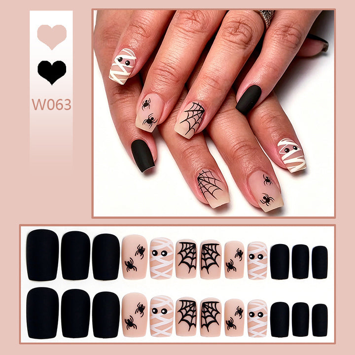 Artificial nail set with creepy Halloween motif and delicate spider designs Bowlift
