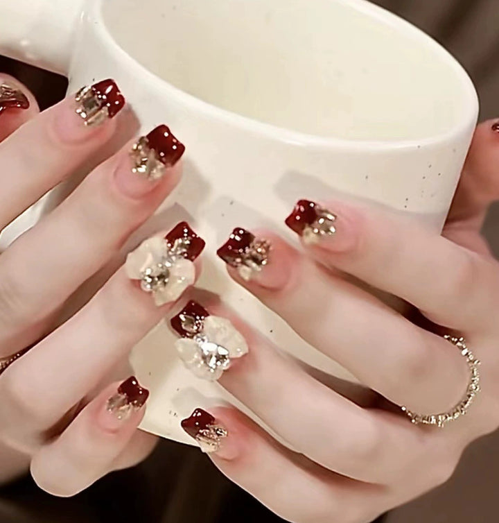 Elegant nail design with pearl embellishment Bowlift