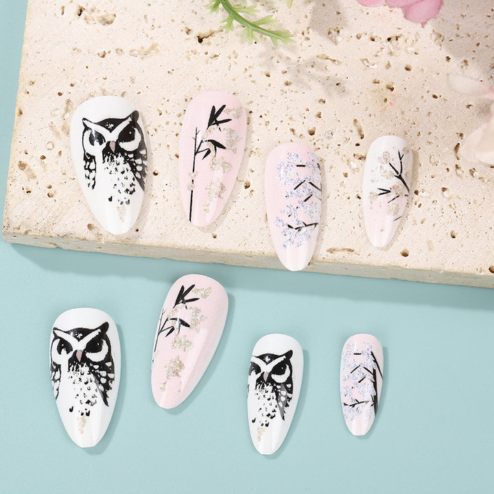 Creative art nails in elegant owl design Bowlift