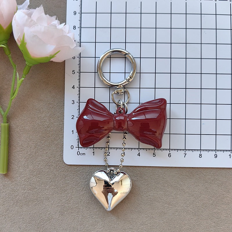 Keychain with bow and heart motif Bowlift