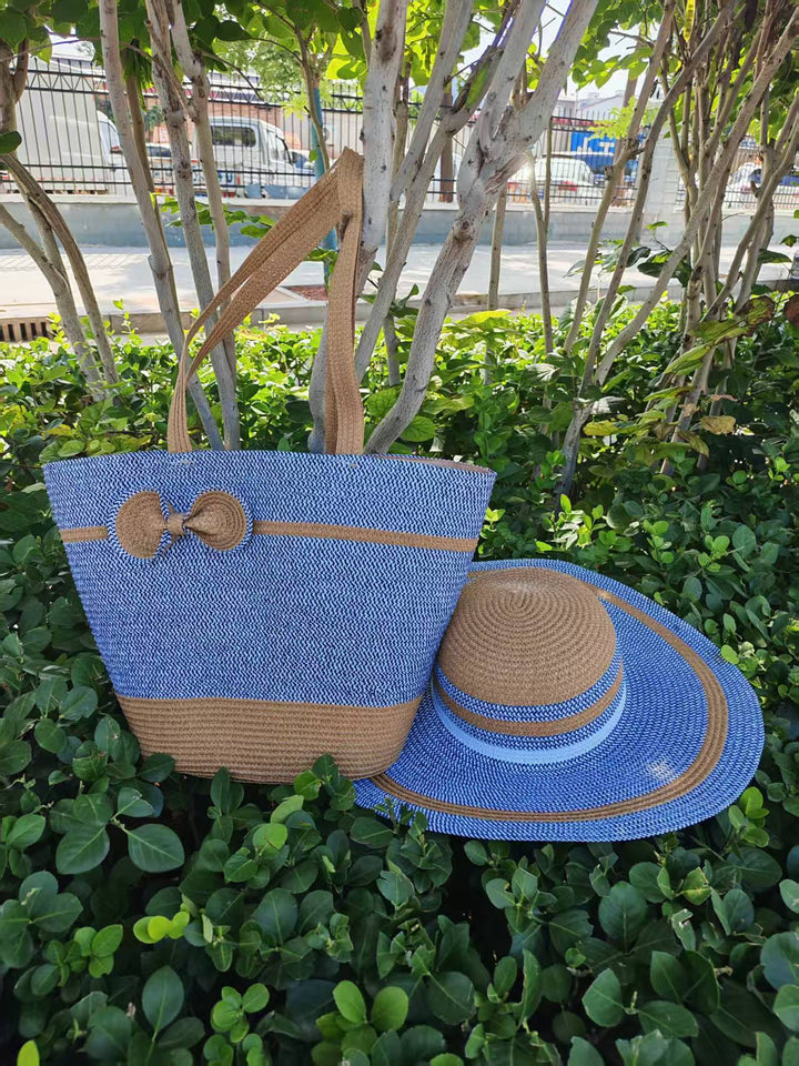 Elegant sun hat with wide brim and subtle stripe pattern Bowlift