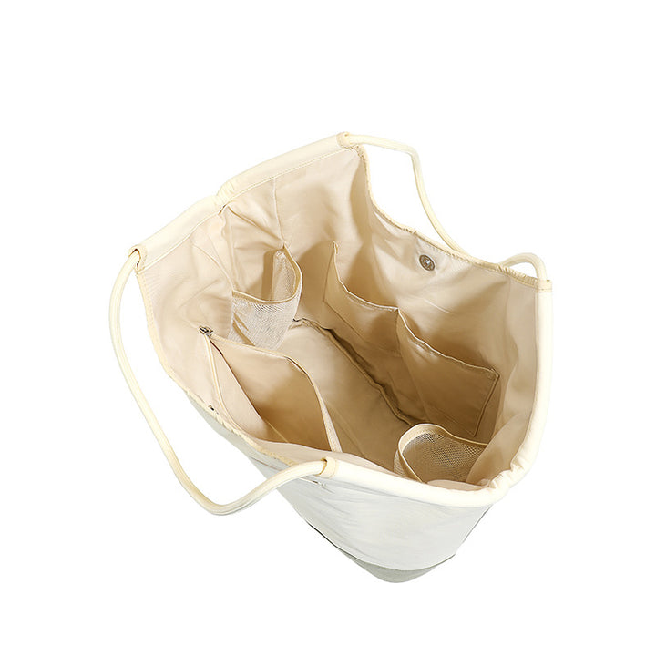 Generous Tote Bag With Multiple Outside Pockets Bowlift