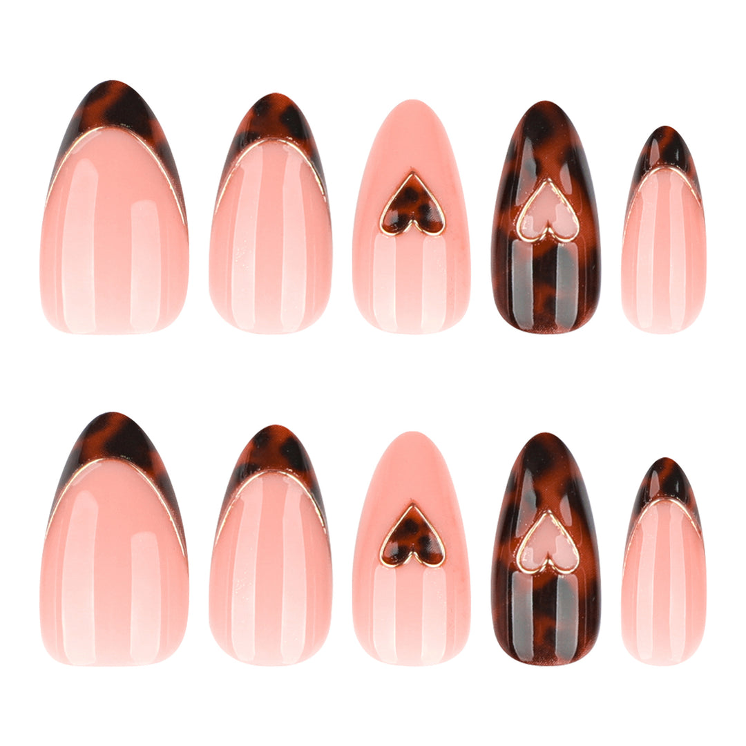 Artful stiletto nails with elegant heart design Bowlift