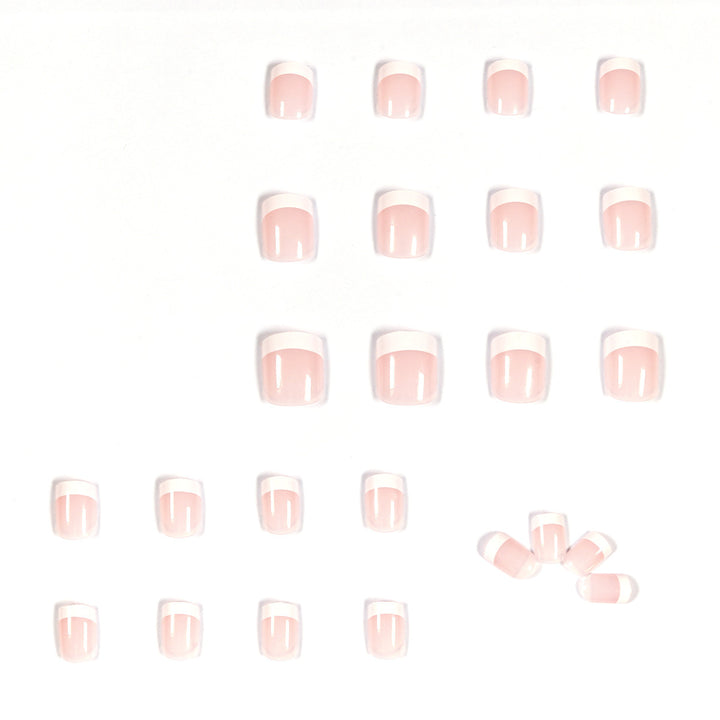 Artificial nails in French Tip design Bowlift
