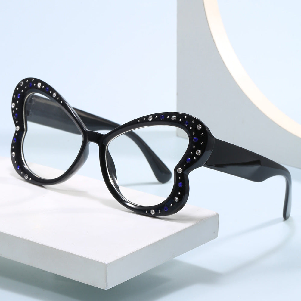 Women's playful heart-shaped sunglasses with glitter accents Bowlift