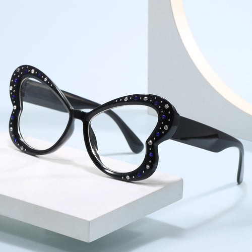 Women's playful heart-shaped sunglasses with glitter accents Bowlift