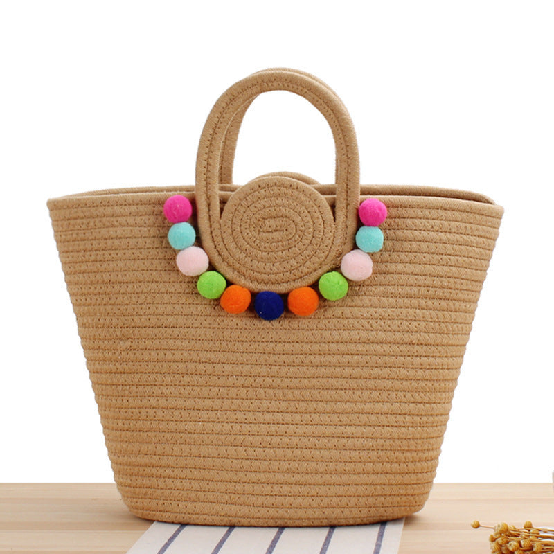 Playful beach bag with colorful pompom decor Bowlift