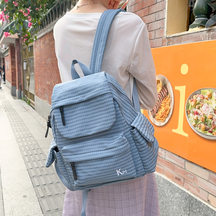 Versatile Grid-Patterned Backpack Bowlift