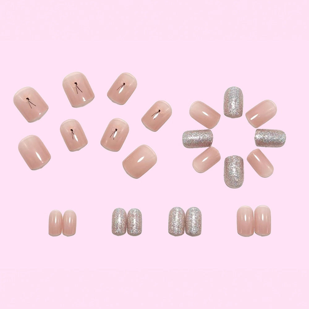 Decorative artificial nails with glitter and delicate floral designs Bowlift