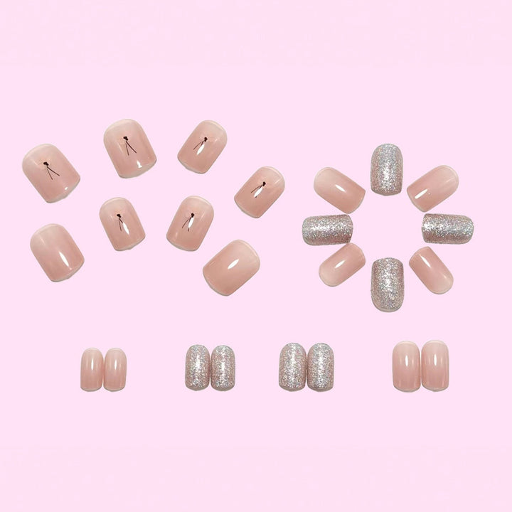 Decorative artificial nails with glitter and delicate floral designs Bowlift