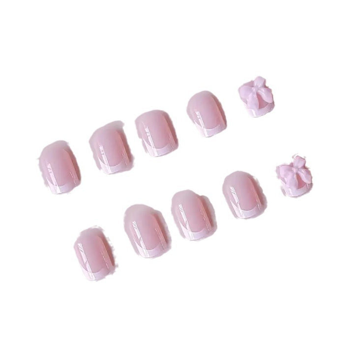 Elegant French Tip Press-On Nails with Bow Detail Bowlift