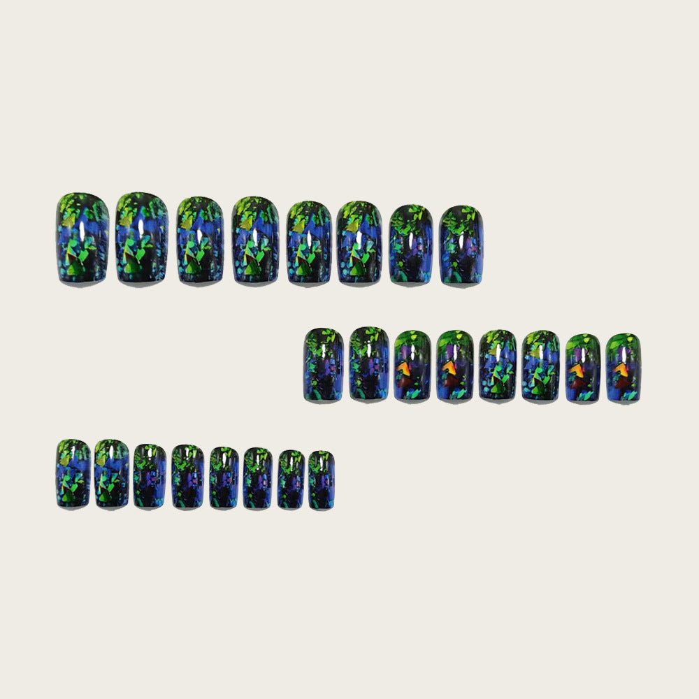 Artificial nails with sparkling glitter design and holographic accents Bowlift
