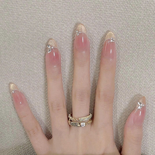 Elegant Stiletto Press-On Nails with Gemstone Accents Bowlift