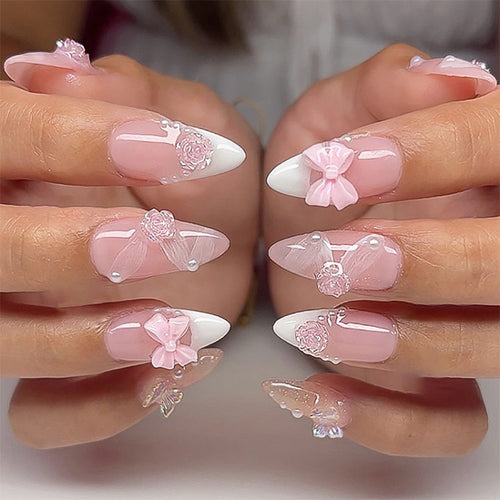 Artistic nail extensions with floral decorations and glitter accents Bowlift