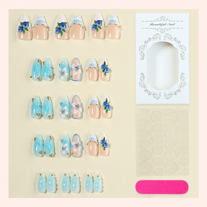 Artificial nail set with floral accents and sparkling details Bowlift