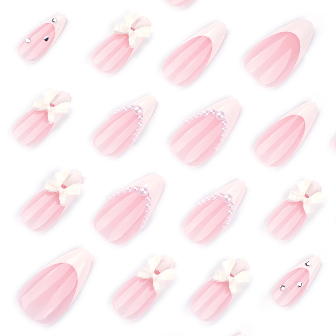 Artful stiletto nails with elegant flower embellishment Bowlift