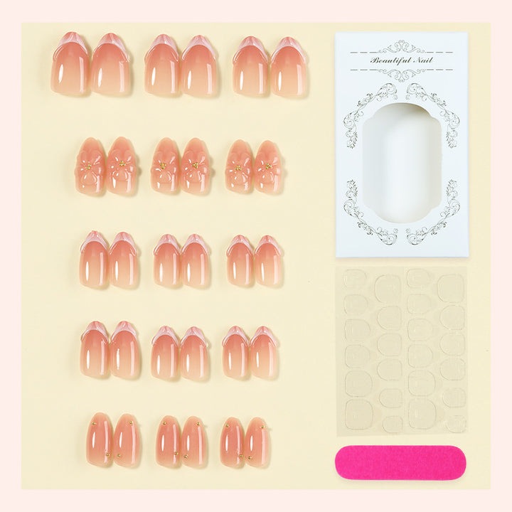 Decorative Press-On Nail Set with Floral Accents Bowlift 1788495814