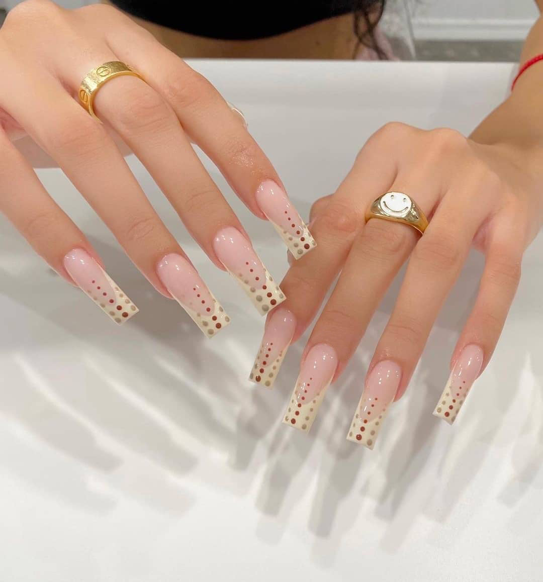 Artistic Nail Extensions with Elegant Dots and Shimmering Ombré Bowlift