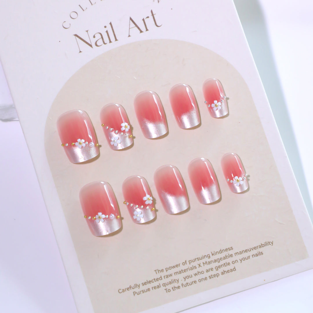 Artful Nail Extensions with delicate flower decorations Bowlift
