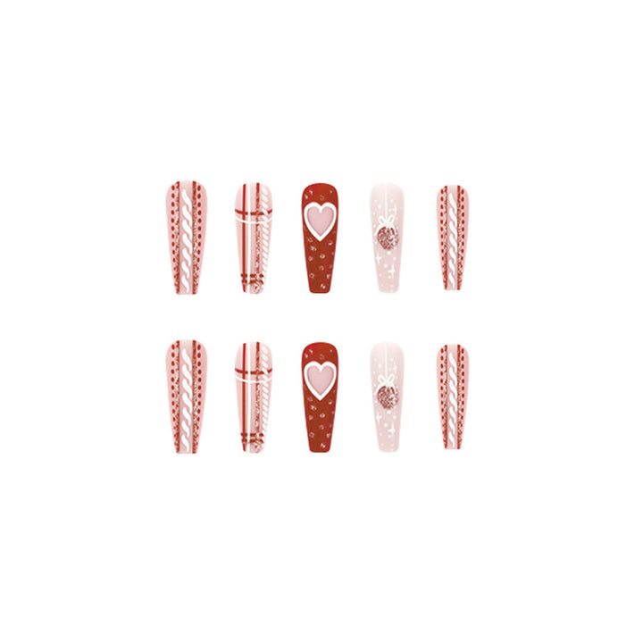 Artful nail art in festive design with heart and Christmas motifs Bowlift