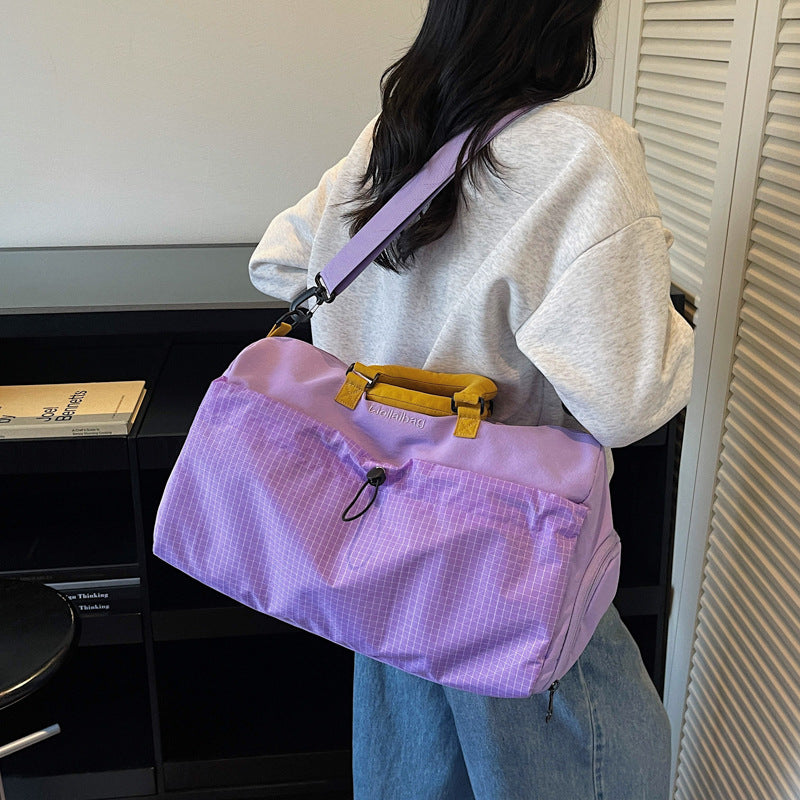 Sporty travel bag with padded carrying handle Bowlift