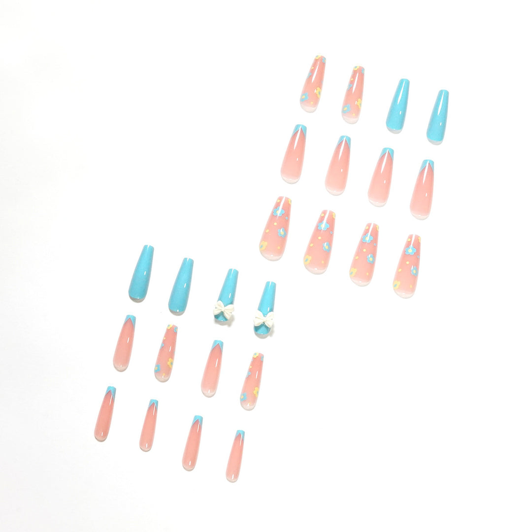 Artistic and playful nail extensions with floral patterns Bowlift