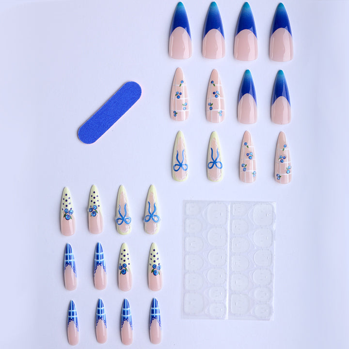 Artificial nails with playful design and elegant accents Bowlift