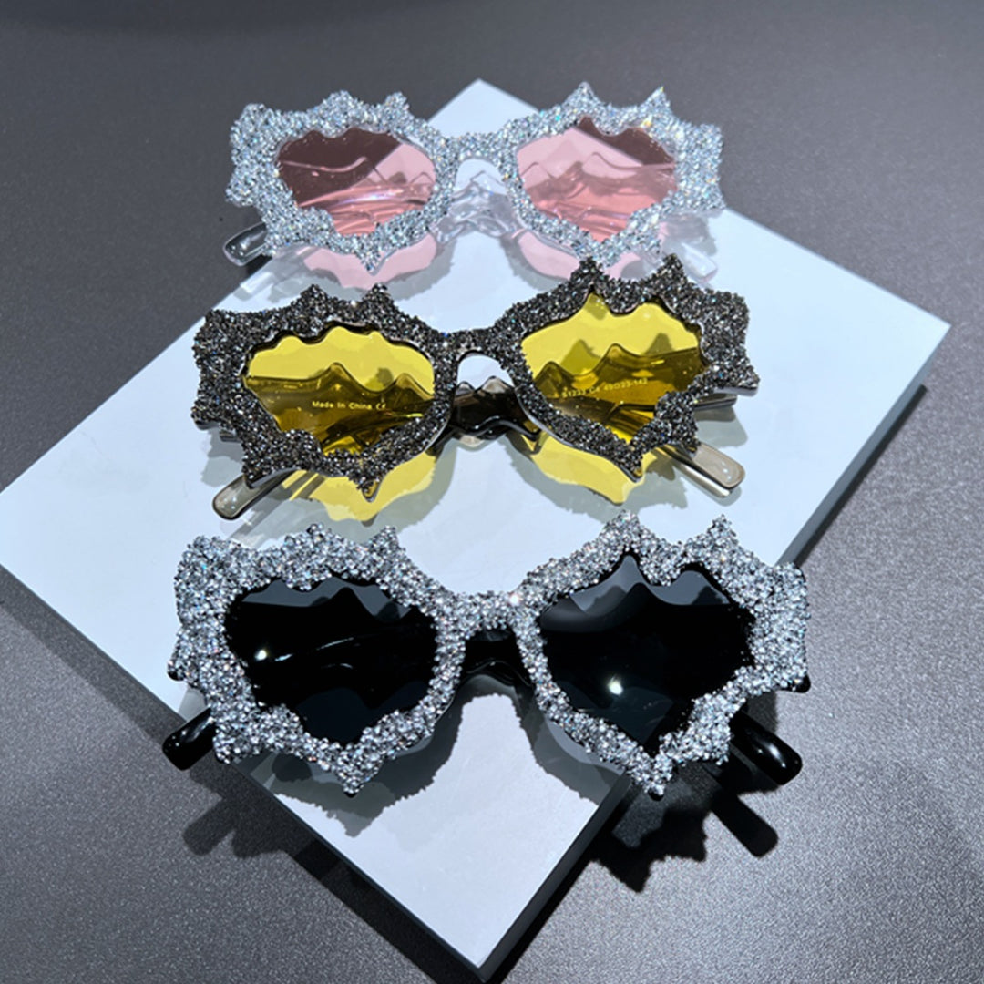 Ladies creative sunglasses in an extravagant design with glitter embellishments Bowlift
