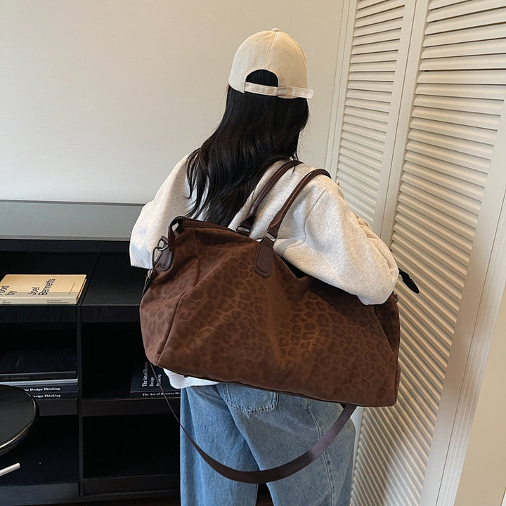 Fashionable travel bag with comfortable carrying handles Bowlift